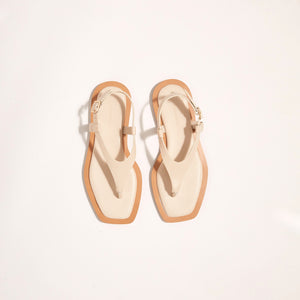 Double front view of Juniper Sandal in Crema, highlighting its timeless elegance and enduring quality, designed for optimal comfort and warm weather wear