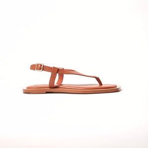 Side view of Juniper Sandal in Tan, emphasizing its gentle and secure embrace, perfect for stepping confidently into any occasion.