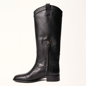Single side view of Birch Boot in Black, showcasing its elegant silhouette and 35mm heel height.
