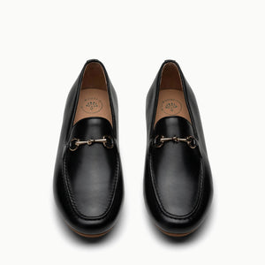 Double front view of Linden Loafer shoes in Black, emphasizing their sleek silhouette and timeless black color