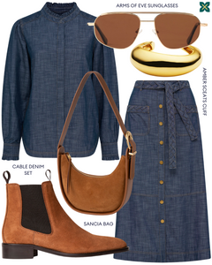 Single side view of Tan Suede Oak Boots paired with a matching outfit, featuring a denim co-ord, earrings, a brown bag and sunglasses.