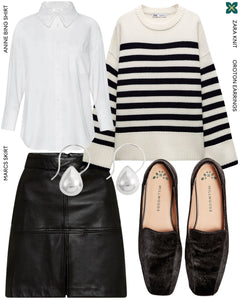 A pair of black ballet flats with a square toe design crafted from pony hair material, showcased in front view. They are accompanied by a coordinating outfit featuring a white shirt, a striped jumper, and a black skirt.