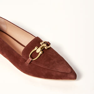 Close-up on toe view of The Poplar Pointed Flat in Brown Suede with Buckle, emphasizing the intricate detailing and craftsmanship, along with the stylish buckle accent