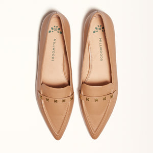 Double front view of The Poplar Pointed Flat in Camel Leather with Millwoods Icon Studs, highlighting its chic appearance and gum sole with a rubber insert for added traction