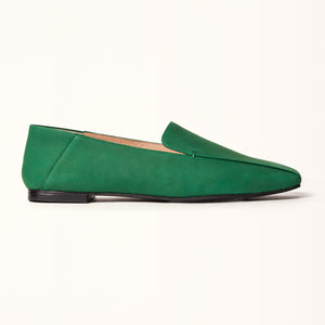 A green square ballet flat shown in a side view for analysis