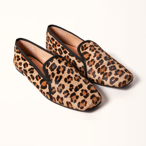 A pair of leopard-print square ballet flats shown in a double view, displayed in a 3/4 perspective