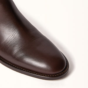 Single 3/4 Toe close up of Birch Boot in Brown leather, highlighting the sleek leather material and equestrian-inspired design
