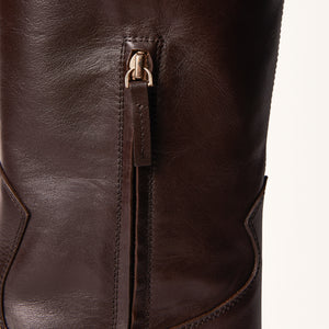 Single zip detail close up of Birch Boot in Brown leather, focusing on the mid-way zipper for easy wear.