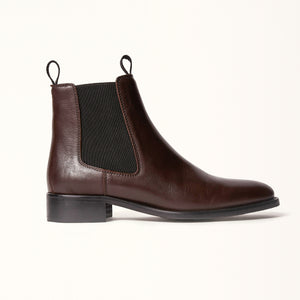 Single side view of Oak Boot in Brown, highlighting the sleek silhouette and tailored pull tabs for easy wear